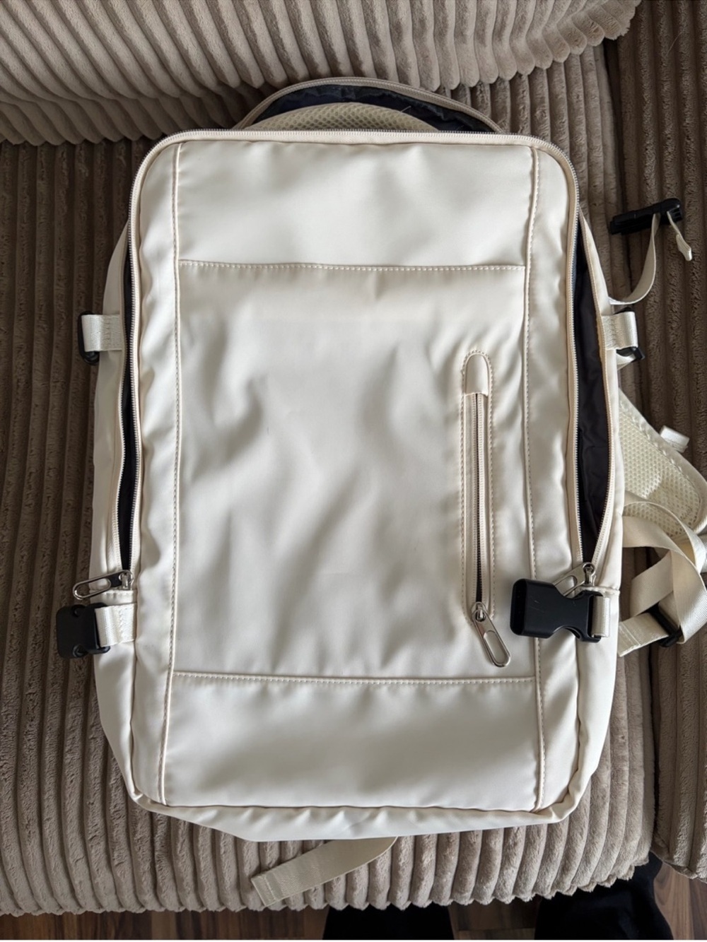 Nova convertible tech back pack in cream color